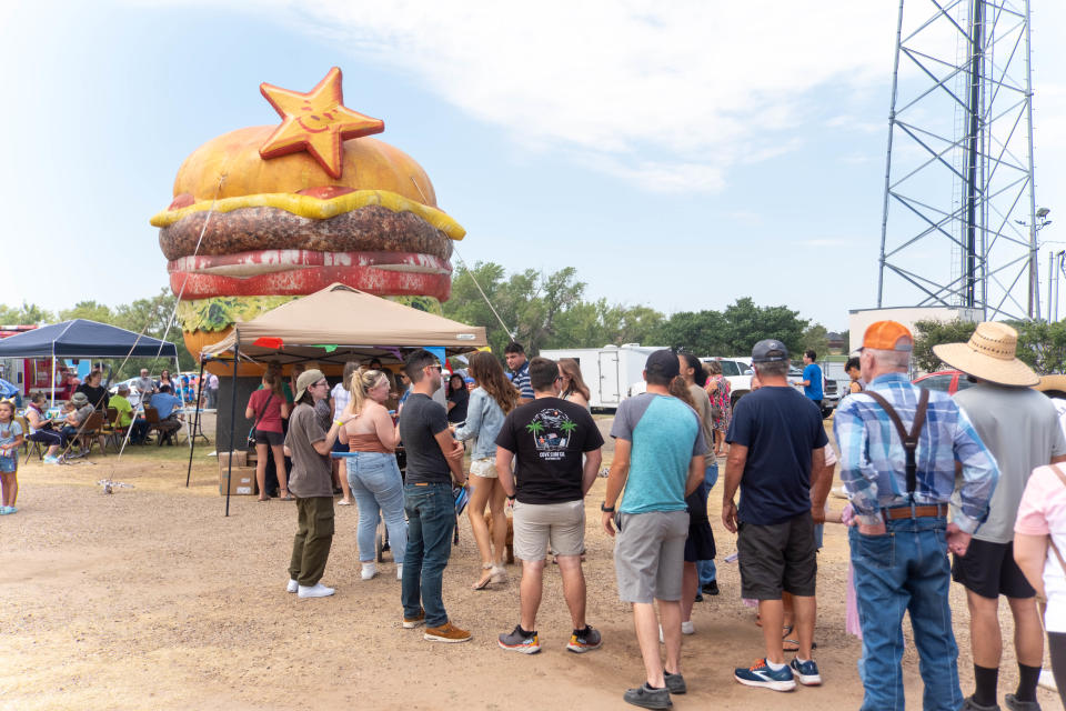 A crowd lines up to purchase tickets  Saturday at Friona's 17th annual Cheeseburger Festival.