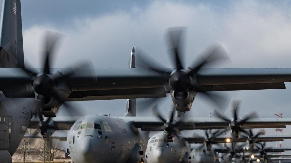 Six U.S. Air Force C-130J Super Hercules from the 86th Airlift Wing taxi down the flightline at Ramstein Air Base, Germany, Feb. 13, 2024. (Senior Airman Andrew Bertain/Air Force)