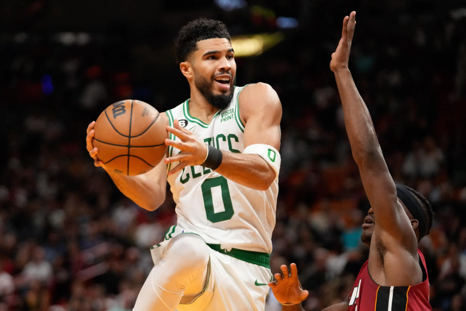 Boston Celtics forward Jayson Tatum makes a pass against the Miami Heat during their game at FTX Arena in Miami on Oct. 21, 2022. (Rich Storry/USA TODAY Sports)