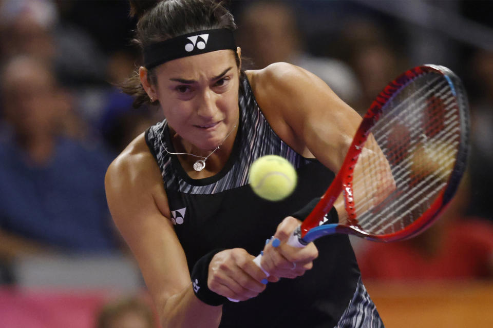 Caroline Garcia, of France, hits against Aryna Sabalenka, of Belarus, in the singles final of the WTA Finals tennis tournament in Fort Worth, Texas, Monday, Nov. 7, 2022. (AP Photo/Ron Jenkins)