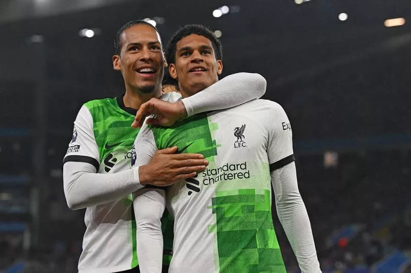 Jarell Quansah is congratulated by Virgil van Dijk after scoring for Liverpool at Aston Villa