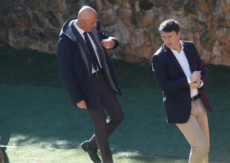 Former Italian Prime Minister Matteo Renzi (R) arrives to attend a meeting of Democratic Party (PD) in Rome, Italy February 19, 2017. REUTERS/Remo Casilli