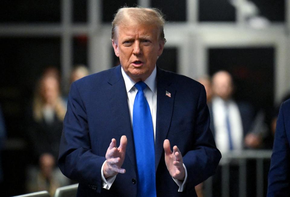 PHOTO: Former president Donald Trump speaks to the press during his trial at Manhattan Criminal Court in New York City, Apr. 22, 2024. (Angela Weiss/POOL/AFP via Getty Images)