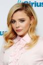 <p>To copy Chloe Grace Moretz's sleek, mermaid waves, begin by prepping your wet hair with Philip Kingsley's <a rel="nofollow noopener" href="https://www.net-a-porter.com/gb/en/product/937298?cm_mmc=Google-ProductSearch-UK--c-_-NAP_EN_UK_PLA-_-UK+-+GS+-+Beauty+-+Generic+Terms+-+High--Beauty_INTL&gclid=CjwKCAjwkYDbBRB6EiwAR0T_-ttN_qK79qAriwsHRhFByyNNUoSdIC46btrfe0pYCHQBxDVK_scmORoC2GsQAvD_BwE&gclsrc=aw.ds" target="_blank" data-ylk="slk:Instant Beach;elm:context_link;itc:0;sec:content-canvas" class="link ">Instant Beach</a>, £22, before blow drying. Then, take large sections of the lengths and gently bend them around a curling iron, such as Cloud Nine's <a rel="nofollow noopener" href="https://www.cloudninehair.com/the-waving-wand?gclid=CjwKCAjwkYDbBRB6EiwAR0T_-h3dDHGvCP97_BC8-X90ihDC1h9xZA8u2gxkBpAFTdBafuqJHJe3VRoCTzkQAvD_BwE" target="_blank" data-ylk="slk:The Curling Wand;elm:context_link;itc:0;sec:content-canvas" class="link ">The Curling Wand</a>, £99, in a Z-shaped pattern, so that the waves shape your face. Finish, with a spritz of Ghd's <a rel="nofollow noopener" href="https://www.ghdhair.com/shine/final-shine-spray-100ml" target="_blank" data-ylk="slk:Final Shine Spray;elm:context_link;itc:0;sec:content-canvas" class="link ">Final Shine Spray</a>, £9.95. </p>