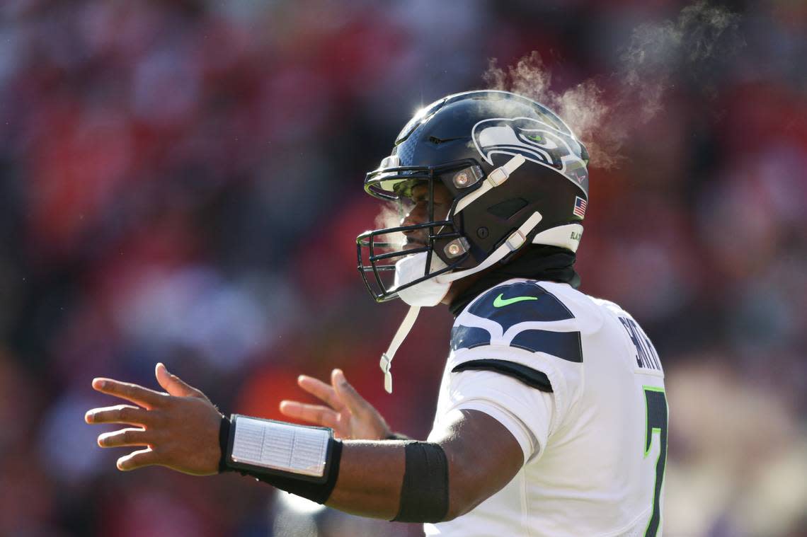 Seattle Seahawks quarterback Geno Smith (7) gestures to the sideline during the first quarter against the Kansas City Chiefs on Saturday, Dec. 24, 2022, in Kansas City, MO.