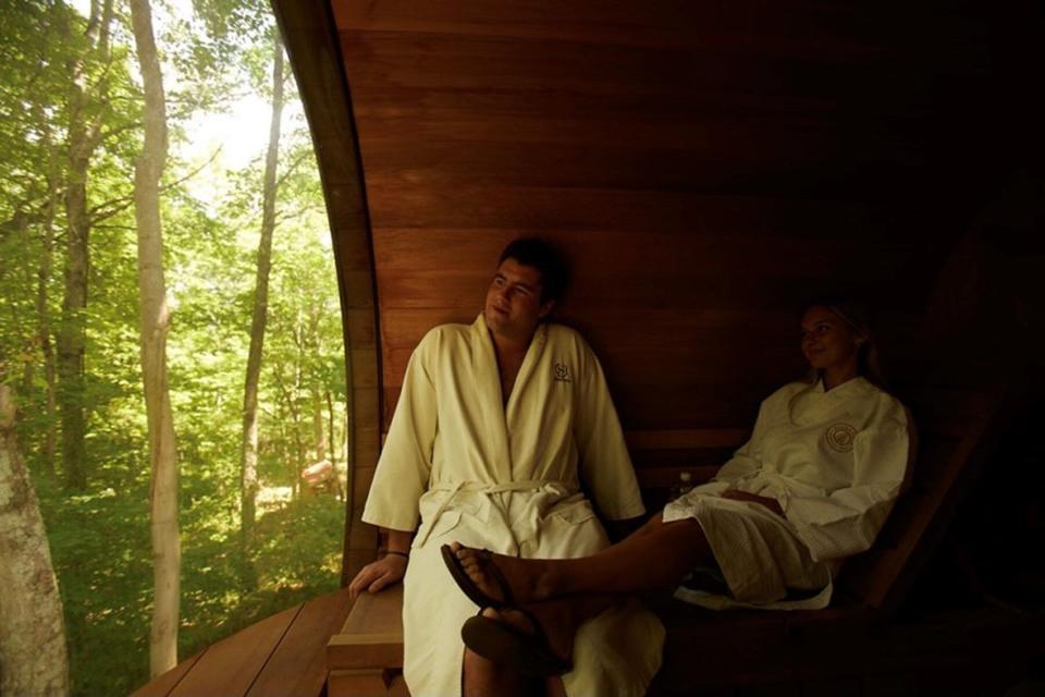 A couple inside the Hocking Hills Sauna Pods