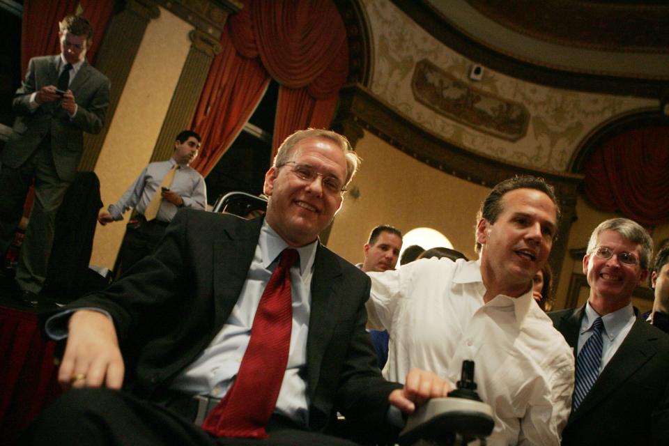 Rep. Jim Langevin, left, and Providence Mayor David Cicilline celebrate Cicilline's election to the U.S. House of Representatives in 2010. This year's election will be the first time since 2010 that one of Rhode Island's congressional seats has been contested without a Democratic incumbent.