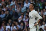 Football Soccer - Spanish La Liga Santander - Real Madrid v Atletico Madrid - Santiago Bernabeu Stadium, Madrid, Spain - 08/04/17 - Real Madrid's Cristiano Ronaldo reacts after conceding a goal. REUTERS/Sergio Perez