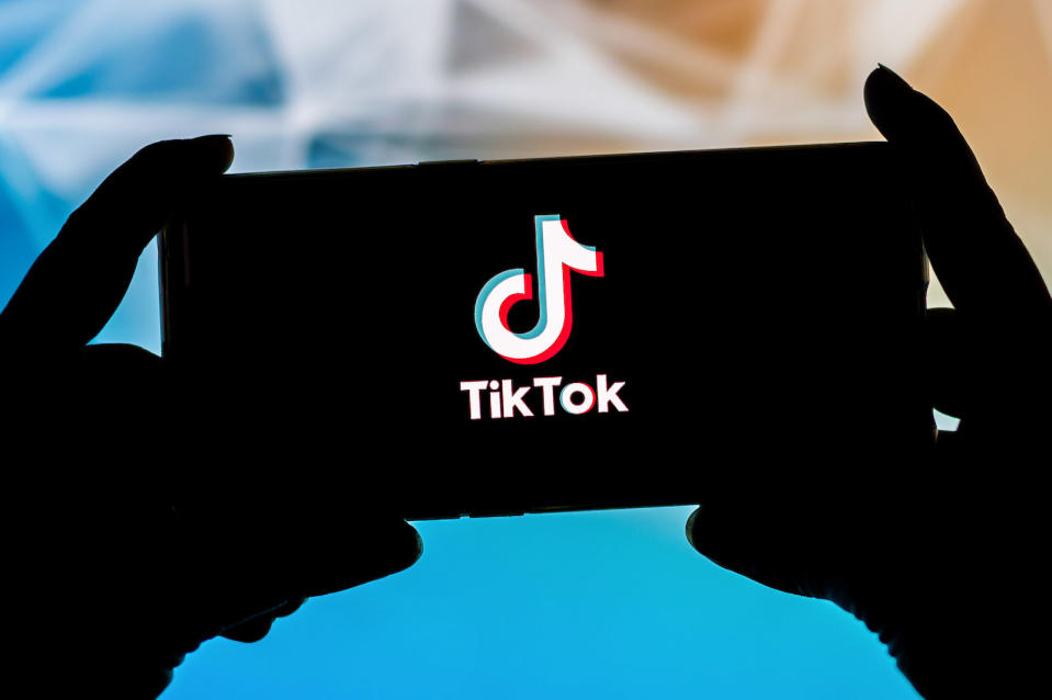 POLAND - 2021/09/23: In this photo illustration a TikTok logo seen displayed on a smartphone. (Photo Illustration by Mateusz Slodkowski/SOPA Images/LightRocket via Getty Images)