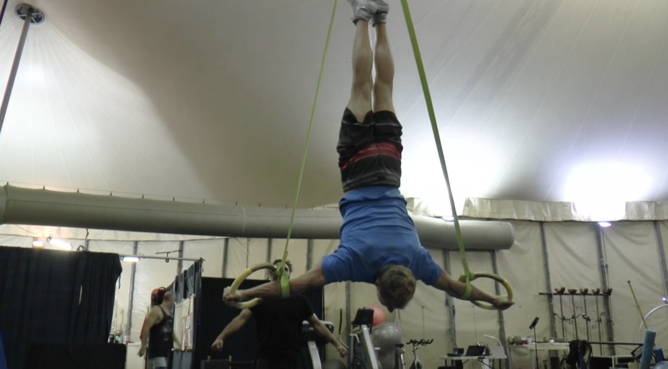 Acrobat Vladimir Novotny on the rings