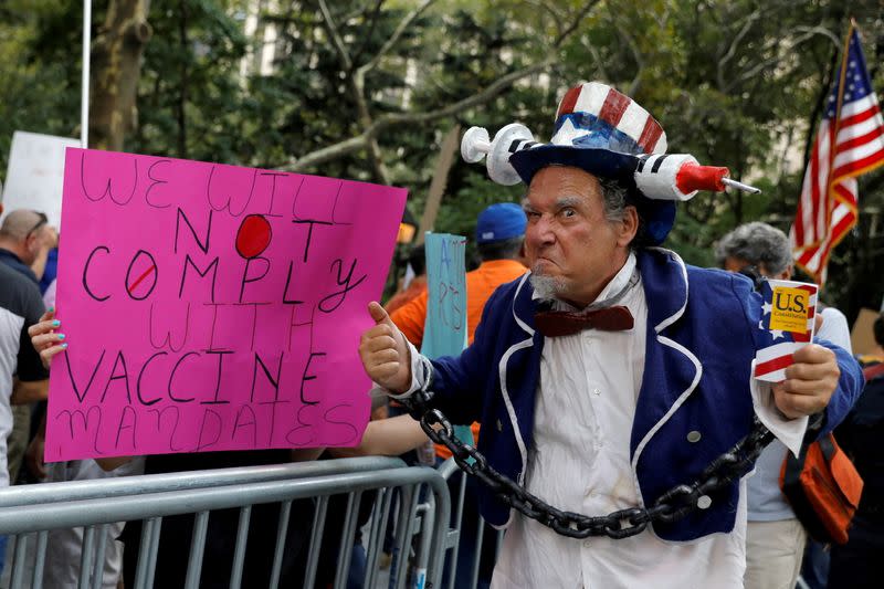 FILE PHOTO: Protest against mandated coronavirus disese (COVID-19) vaccines and vaccine passports at City Hall in Manhattan, New York City,