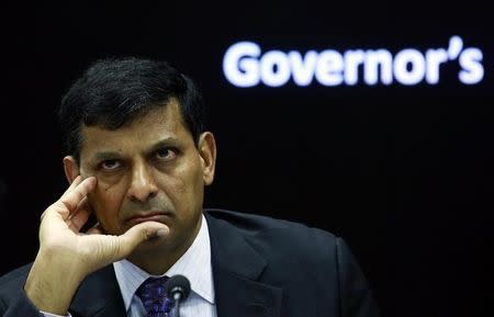 The Reserve Bank of India (RBI) Governor Raghuram Rajan listens to a question during a news conference after the bi-monthly monetary policy review in Mumbai September 30, 2014. REUTERS/Danish Siddiqui