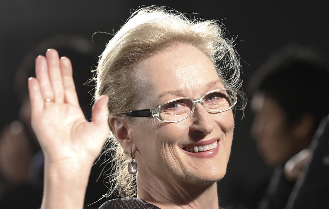 Meryl Streep waves for photographers during the Japan premiere of "Into the Woods" in Tokyo Wednesday, March 4, 2015. (AP Photo/Shizuo Kambayashi)