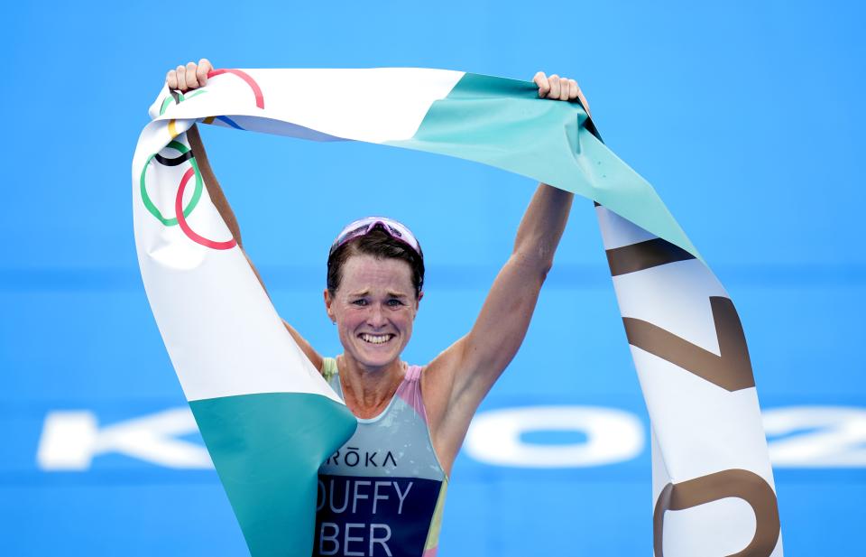 Bermuda’s Flora Duffy celebrates her historic victory (Danny Lawson/PA) (PA Wire)