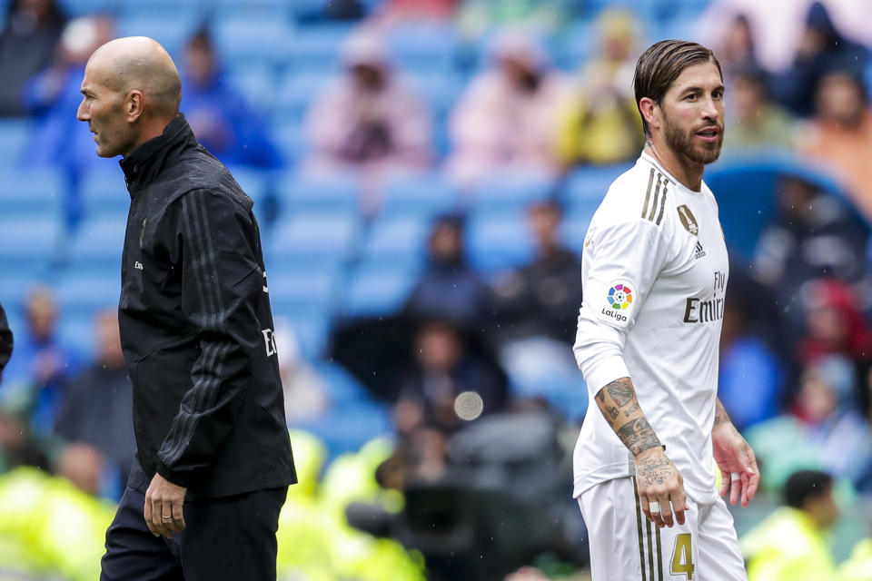 The tactical nous of Zinedine Zidane (left) and an airtight defense led by Sergio Ramos will help Real Madrid in the Champions League. (Photo by David S. Bustamante/Soccrates/Getty Images)