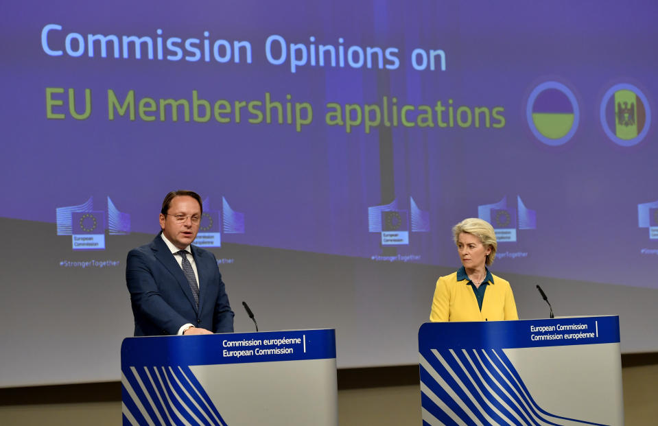 European Commission President Ursula von der Leyen, right, and European Commissioner for Neighborhood and Enlargement Oliver Varhelyi participate in a media conference after a meeting of the College of Commissioners at EU headquarters in Brussels, Friday, June 17, 2022. Ukraine's request to join the European Union may advance Friday with a recommendation from the EU's executive arm that the war-torn country deserves to become a candidate for membership in the 27-nation bloc. (AP Photo/Geert Vanden Wijngaert)