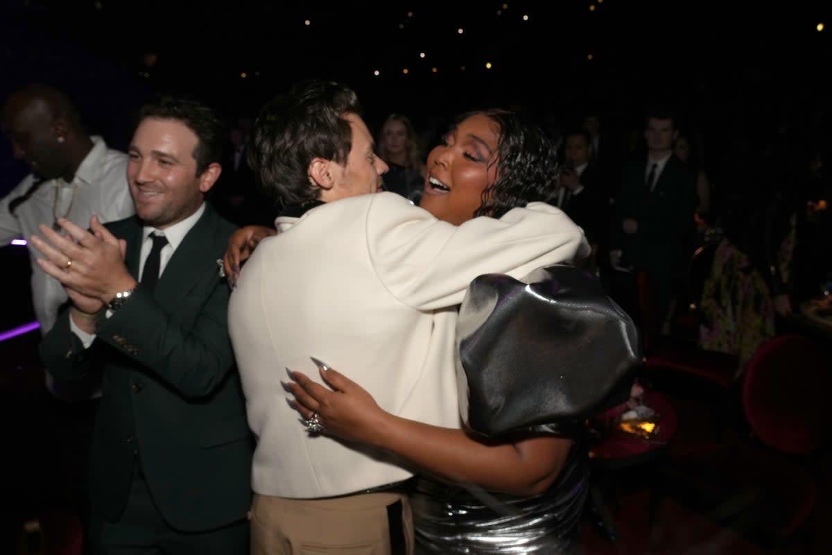 Lizzo and pal Harry Styles were the picture of friendship at Sunday night’s Grammy Awards  (Getty Images )