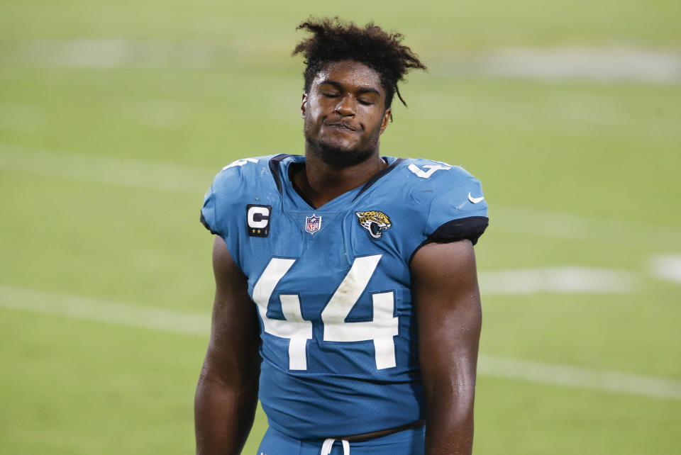 Jacksonville Jaguars middle linebacker Myles Jack (44) reacts after a Miami Dolphins touchdown while on the bench during the second half at TIAA Bank Field.