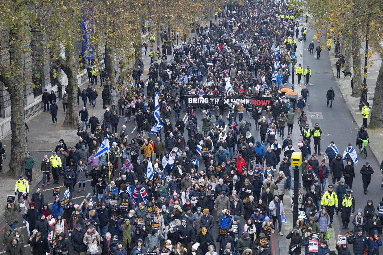 LONDON, UNITED KINGDOM - NOVEMBER 26: Tens of thousands of people march from the Royal Courts of Justice, towards Parliament Square against 