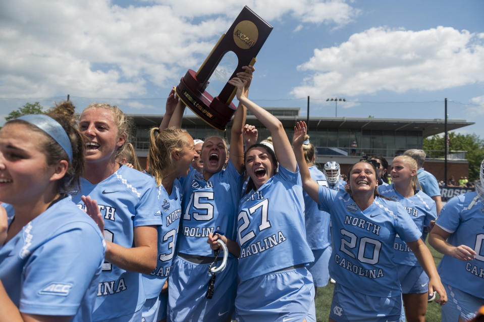 North Carolina players celebrate after winning the NCAA college Division 1 women's lacrosse championship against Boston College in Baltimore, Sunday, May 29, 2022. (Vincent Alban/The Baltimore Sun via AP)