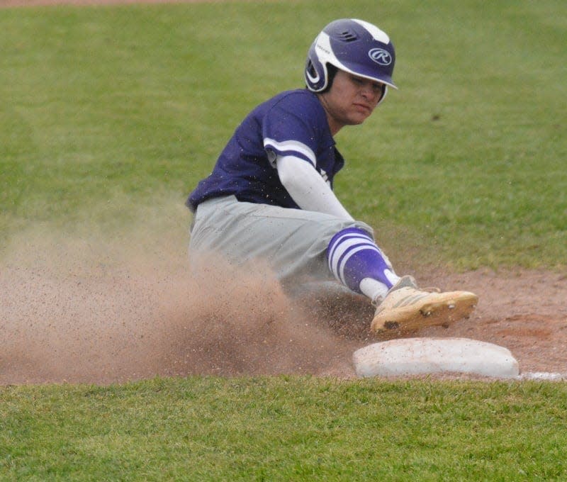 A Mason High School baseball player slides into third base during a District 29-2A baseball game in San Saba during the 2021 season.