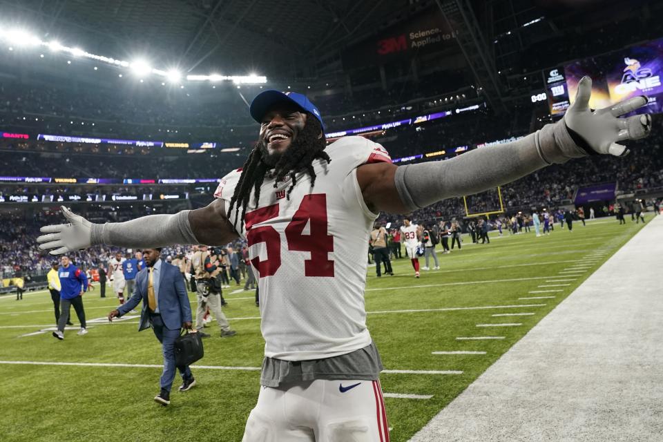 New York Giants' Jaylon Smith celebrates after an NFL wild card football game against the Minnesota Vikings Sunday, Jan. 15, 2023, in Minneapolis. The Giants won 31-24. (AP Photo/Abbie Parr)