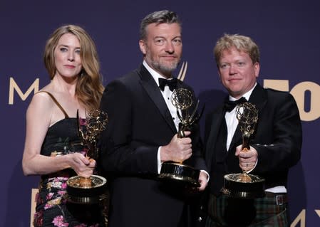 71st Primetime Emmy Awards - Photo Room – Los Angeles, California, U.S., September 22, 2019 - Annabel Jones, Charlie Brooker and Russel McLean pose backstage with their Outstanding Television Movie award for Bandersnatch (Black Mirror)