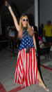 <p>The heiress spent the holiday in Ibiza, but she didn’t forget her American roots. She was proud to wear the stars and stripes for a party. (Photo: BACKGRID) </p>