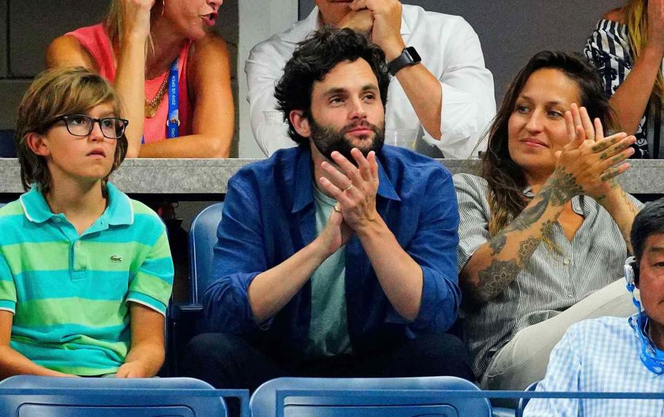 Cassius Kirke, Penn Badgley amd Domino Kirke cheer on Serena WIlliams and Roger Federer at the 2019 US Open Tennis Championships on September 03, 2019 in New York City