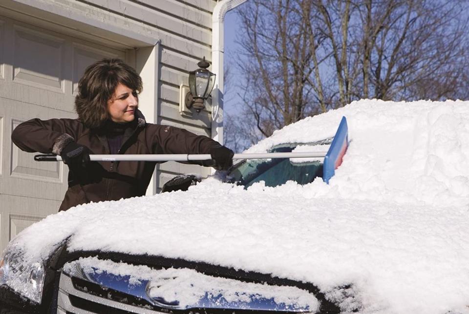 The SnoBrum Original Snow Removal Tool take the work out of cleaning your car this winter. Image via Amazon.