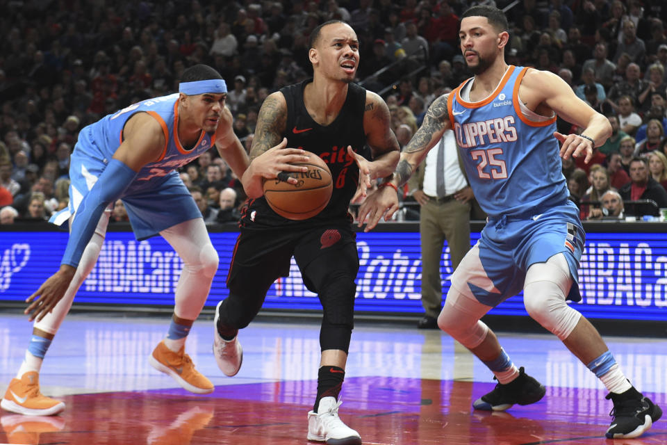 Shabazz Napier (center) is headed to Brooklyn. (AP Photo/Steve Dykes)