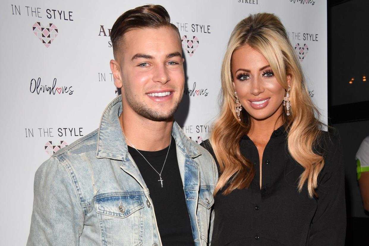 Loved up: Chris Hughes and Olivia Attwood: Stuart C. Wilson/Getty