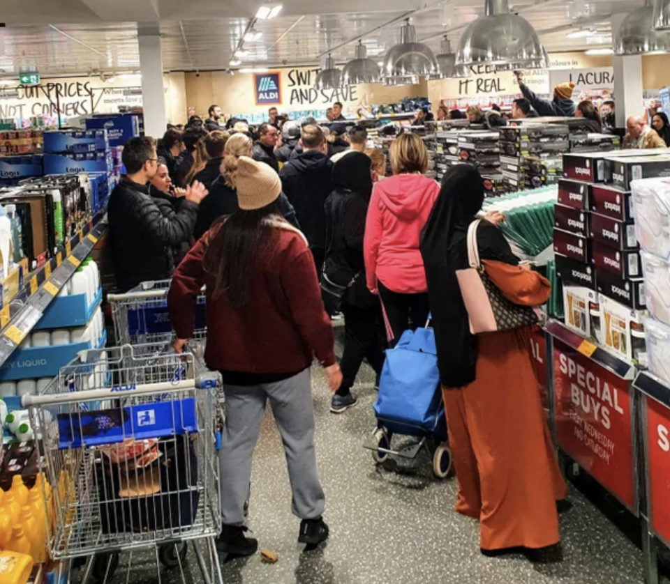 Shoppers descend on the Special Buys section of a Melbourne supermarket over the weekend. Source: Reddit/ PedGetsFed