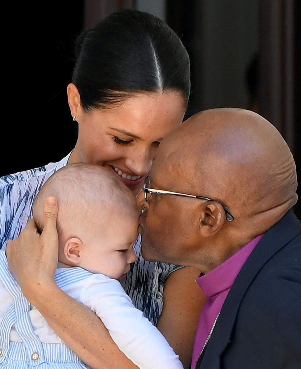 Desmond Tutu with the Duchess of Sussex and Archie in 2019 (Toby Melville/PA) (PA Archive)