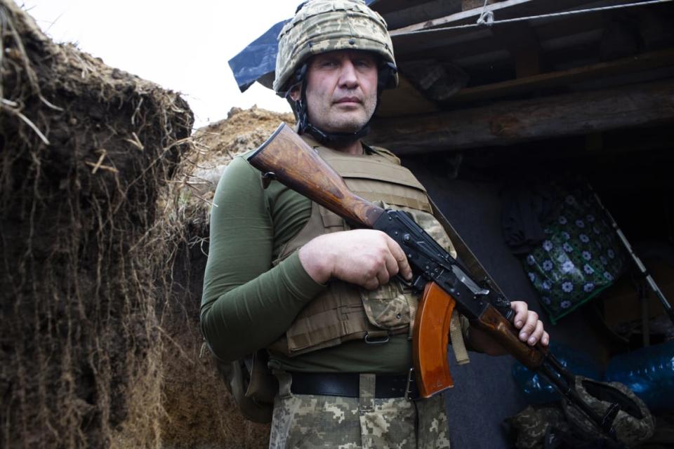 <div class="inline-image__caption"><p>A Ukrainian soldier shows a machine gun near the front line in Zolote.</p></div> <div class="inline-image__credit">Emil Filtenborg</div>