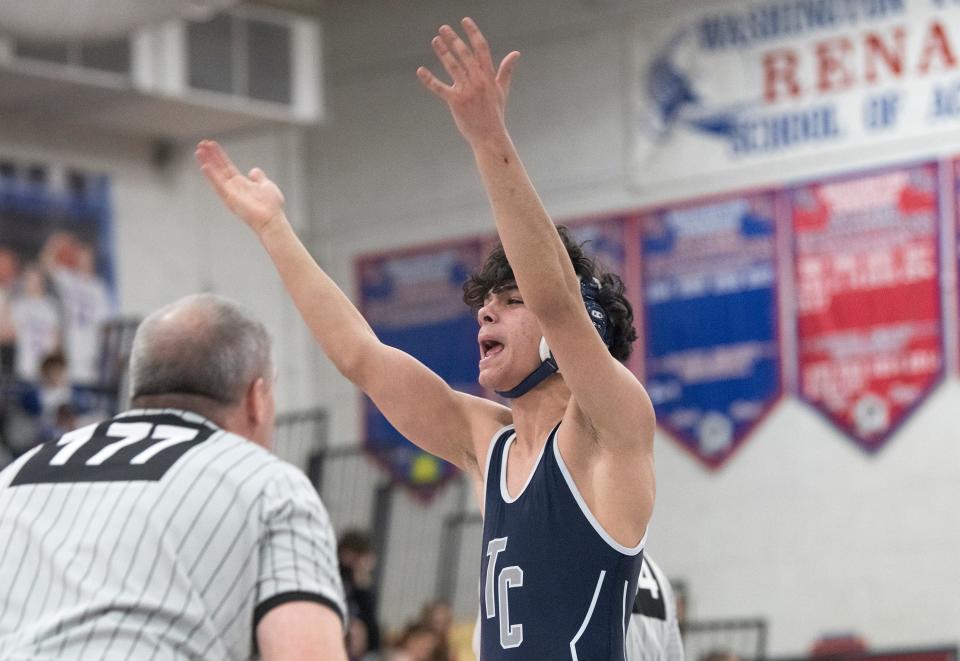 Timber Creek's Sebastiano Spina celebrates after pinning Williamstown's Michael Davidson to win the 132 lb. bout of the final round of the District 30 wrestling tournament held at Washington Township High School on Saturday, February 19, 2022.