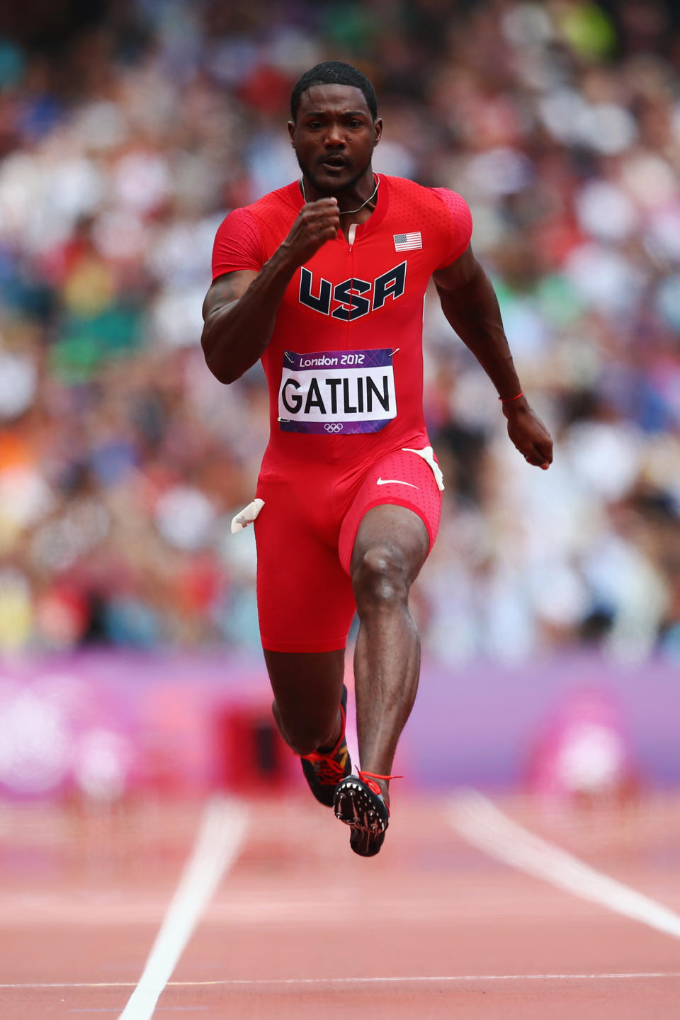 LONDON, ENGLAND - AUGUST 04: Justin Gatlin of the United States competes in the Men's 100m Round 1 Heats on Day 8 of the London 2012 Olympic Games at Olympic Stadium on August 4, 2012 in London, England. (Photo by Michael Steele/Getty Images)