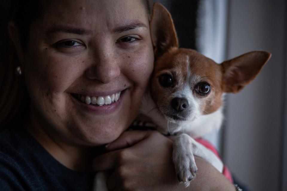 Maria Sanchez at her home with her dog Daisy Dukes in West Palm Beach.