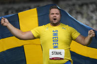 Daniel Stahl, of Sweden, celebrates after winning the final of the men's discus throw at the 2020 Summer Olympics, Saturday, July 31, 2021, in Tokyo. (AP Photo/David J. Phillip)