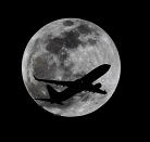 An airliner crosses the moon's path, Monday, April 14, 2014, above Whittier, Calif., approximately one hour before a total lunar eclipse. Then, on April 29, the Southern Hemisphere will be treated to a rare type of solar eclipse. In all, four eclipses will occur this year, two lunar and two solar. (AP Photo/Nick Ut)