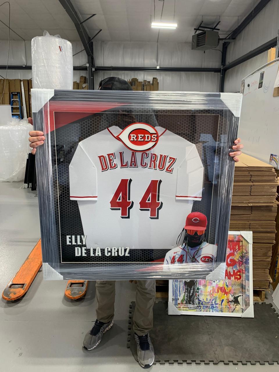 The Reds not only provided a jersey. They provided a jersey signed by the 21-year-old Reds' shortstop, though Elly De La Cruz rarely gives autographs.