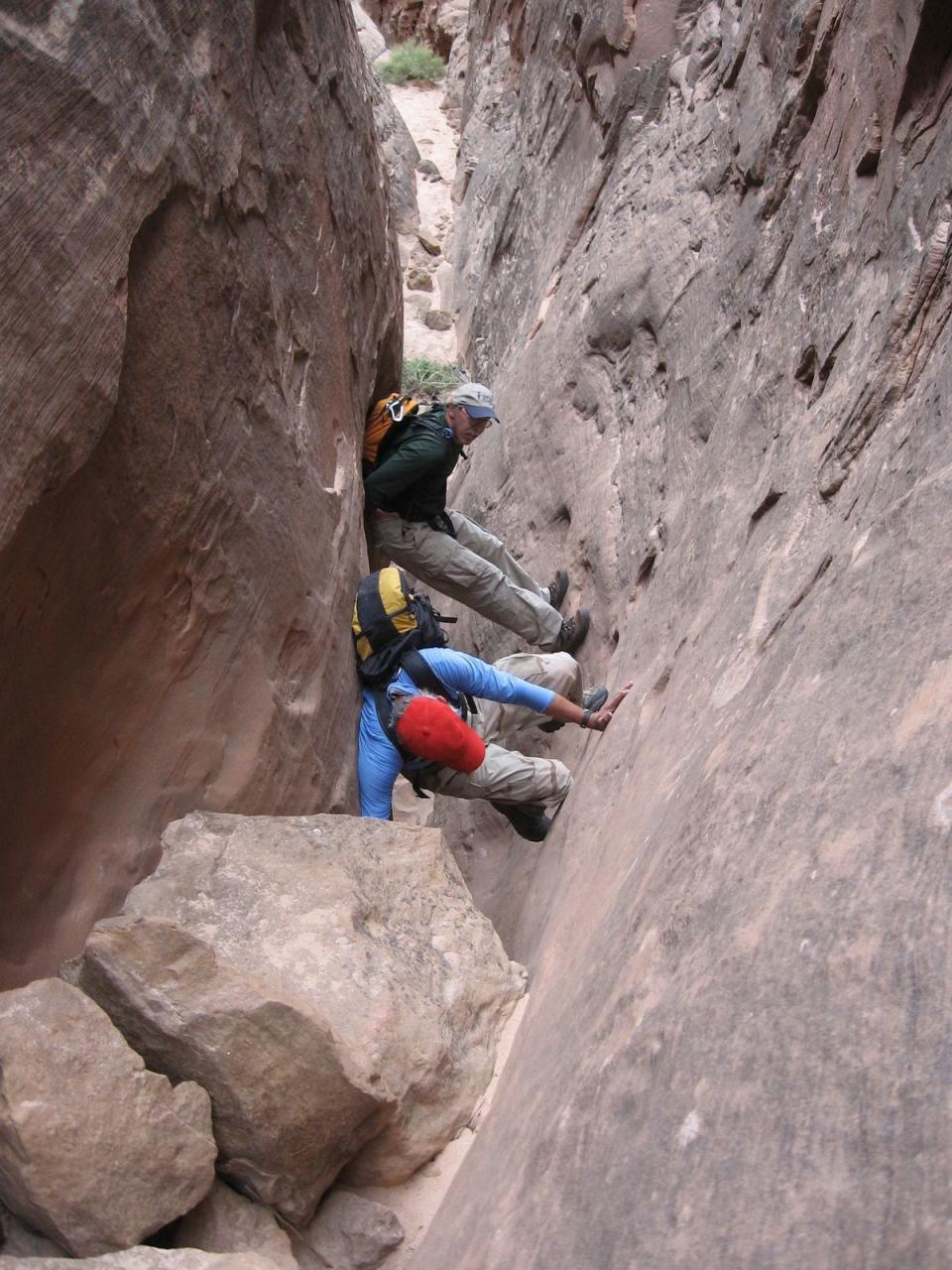 Louis Cicotello and his brother, David, free climbing the exit out of Robbers Roost Canyon in Utah in 2007.