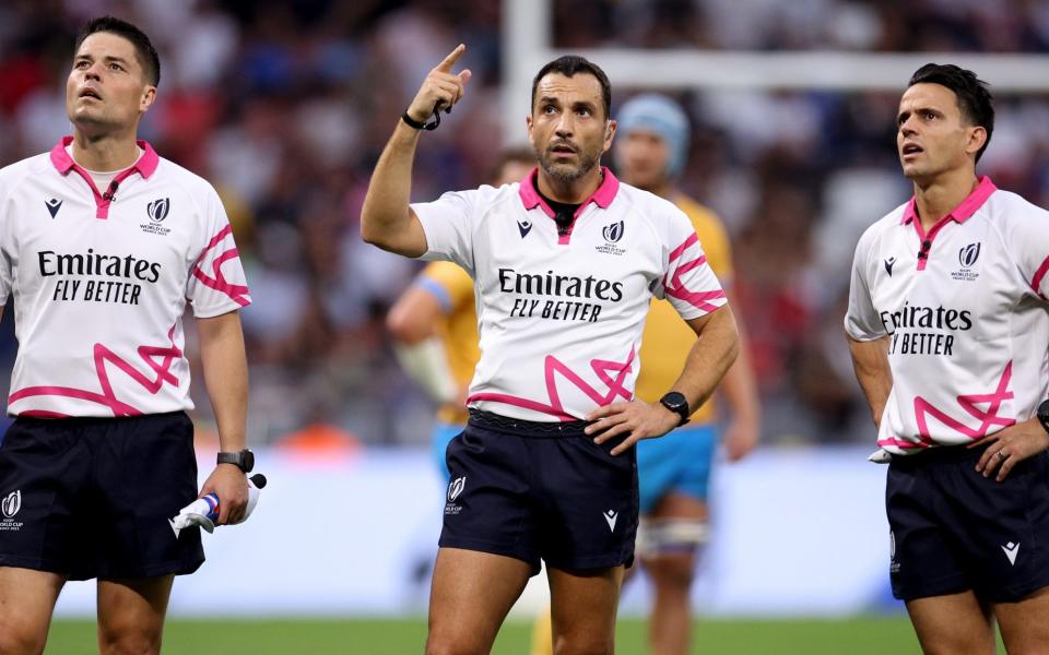 Referee Mathieu Raynal talks to the TMO