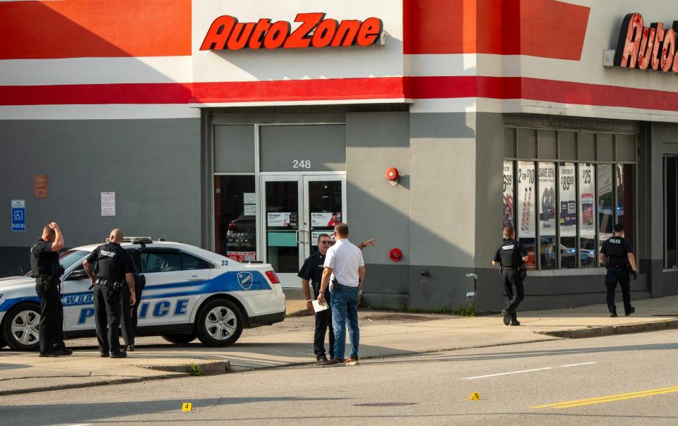 Worcester police detectives investigate a shooting on Park Avenue near the AutoZone Wednesday.