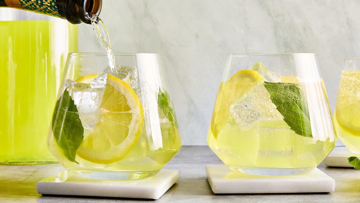 limoncello spritz filled with basil and lemon slices