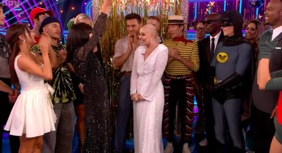 Amy Dowden being cheered on by the cast of ‘Strictly’ 2023 after she made a surprise appearance amid her cancer treatment (BBC)