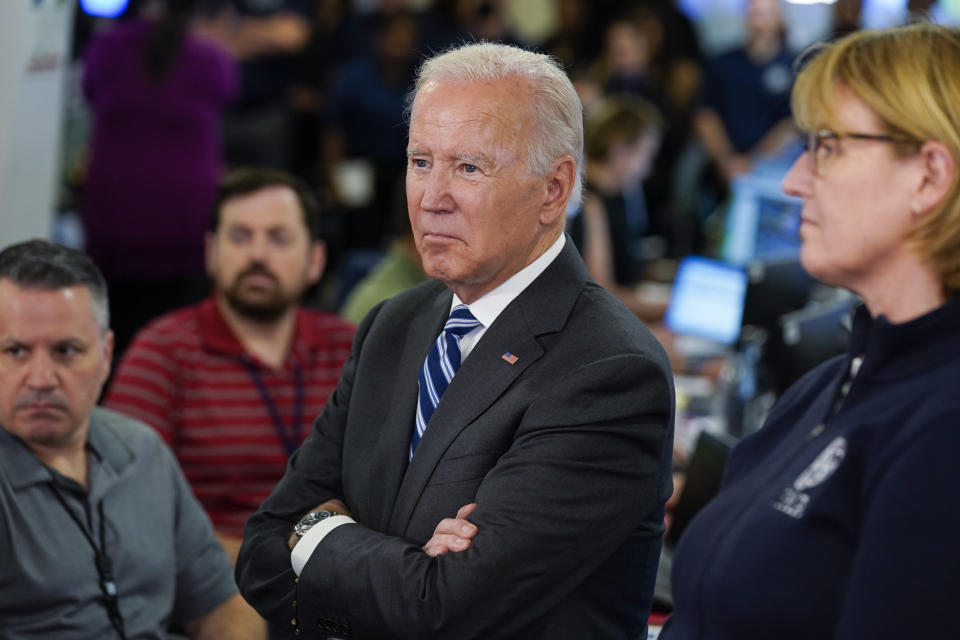 President Joe Biden and FEMA Administrator Deanne Criswell listen during a briefing about Hurricane Ian as they visit FEMA headquarters, Thursday, Sept. 29, 2022, in Washington. (AP Photo/Evan Vucci)