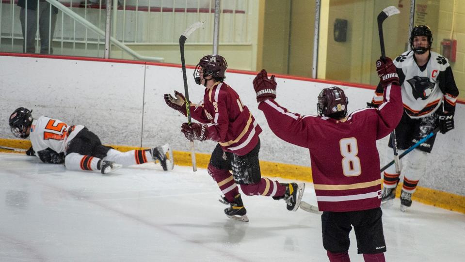 Algonquin's Andrew Hodge, center, celebrates after scoring against Marlborough earlier this season.