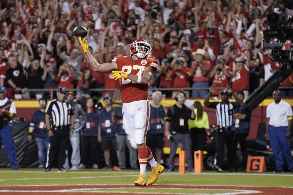 Kansas City Chiefs tight end Travis Kelce celebrates after scoring on an 8-yard touchdown catch during the second half of an NFL football game against the Las Vegas Raiders Monday, Oct. 10, 2022, in Kansas City, Mo. (AP Photo/Ed Zurga)