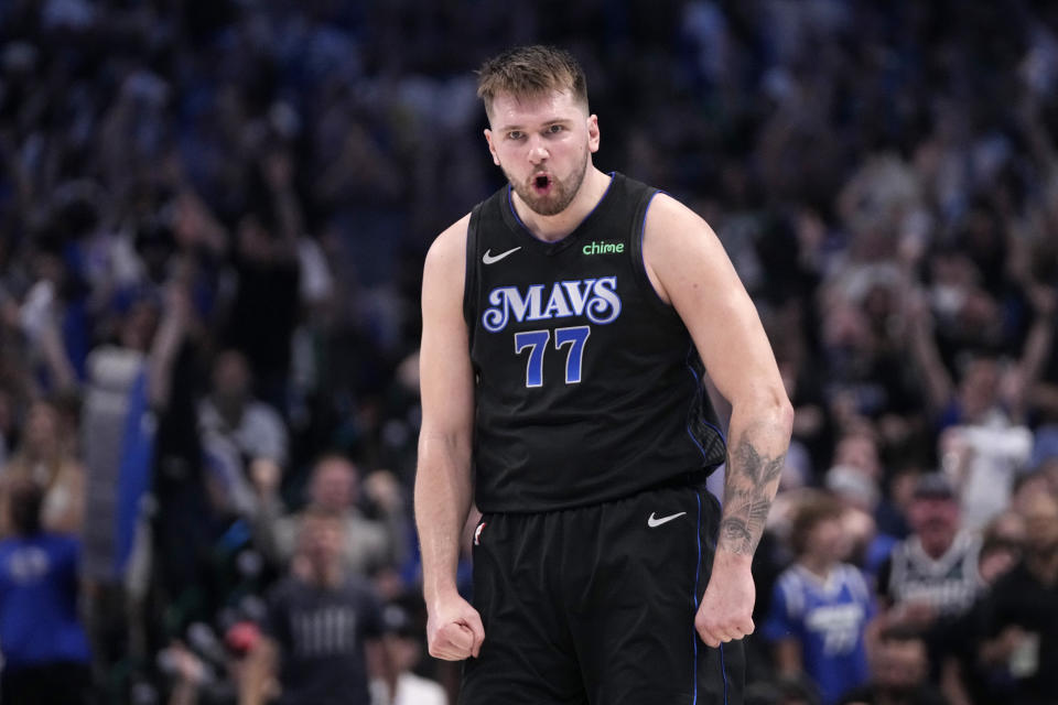 Dallas Mavericks' Luka Doncic celebrates after sinking a basket in the second half of Game 6 of an NBA basketball second-round playoff series against the Oklahoma City Thunder Saturday, May 18, 2024, in Dallas. (AP Photo/Tony Gutierrez)